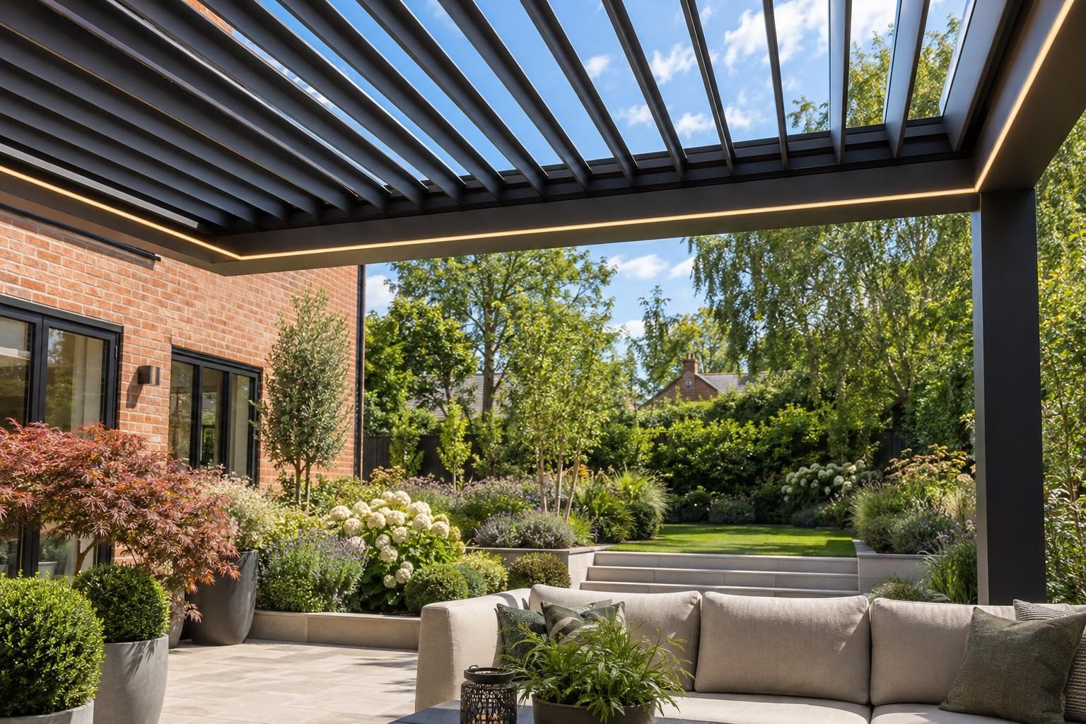 Looking up through open pergola louvres with warm-white LED lighting in the frame Looking up through open pergola louvres with warm-white LED lighting in the frame